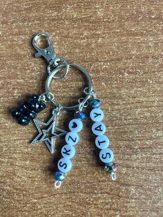 a keychain that has some beads on it