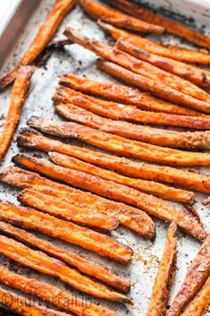 baked sweet potato fries on a baking sheet