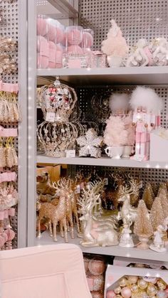 a room filled with lots of pink and white items