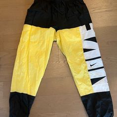 Never Worn Nike Joggers Cheap Nike Orange Bottoms, Nike Athleisure Pants For Summer, Nike Sporty Summer Pants, Yellow Athleisure Pants For Streetwear, Yellow Athleisure Bottoms For Streetwear, Nike Yellow Sport Bottoms, Nike Yellow Bottoms For Summer, Nike Yellow Summer Bottoms, Yellow Sporty Nylon Bottoms