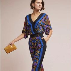 Anthropologie Jumpsuit Scarf Black Blue Floral V Neck Print Slimming With Side Hidden Zipper New With Tags * Size: 2 Retail $169 Uk 6’ Us 2 * Eu 34 * There Is A Line To Prevent Store Return 100% Poly Crepe Fitted Printed V-neck Jumpsuits And Rompers, Bohemian V-neck Printed Jumpsuits And Rompers, Summer Jumpsuit With Floral Print And V-neck, Tropical V-neck Printed Jumpsuits And Rompers, Bohemian Printed V-neck Jumpsuit, Anthropologie, Blue Black, Pant Jumpsuit, Jumpsuit Romper