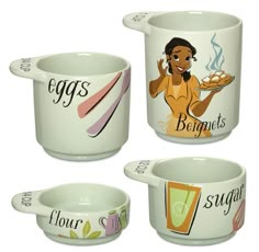 four ceramic mugs with different designs on them