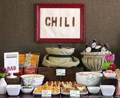 a buffet table filled with different types of food and snacks on it's sides