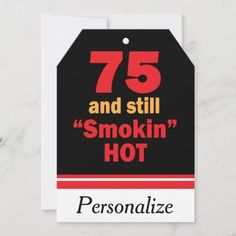 a black and red tag with the words 75 and still smokiin'hot