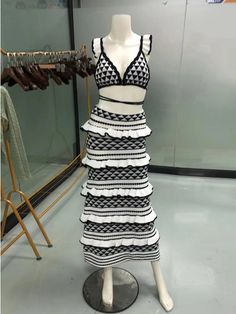 This dress is perfect for Summer beach, pool parties or a sizzling summer date night! Backless stretchy thick knit triangle top with flutters at the shoulders, criss-cross tie at the waist and back. Gorgeous matching fitted knit skirt with stripes and layered ruffles. Fitted outfit to accentuate your curves. Hand wash inside-out cold, hang dry. Women's sizes: S-L. Outfit has some stretch, but is fitted. We recommend ordering your normal size. Good things take time. Quicker shipping: This dress ships directly to you from our overseas warehouse, and will arrive in approximately 7-12 business days. Limited Stock. Crochet Black And White, Knit Triangle, Crochet Black, Summer Date Night, Fit Skirt, Summer Festivals, Ankle Length Skirt, Bralette Top, Crochet Set