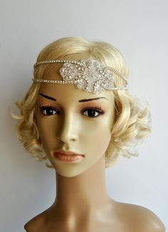 Stunning Clear Rhinestone Crystal Silver 1920s headpiece - flapper headband. Ready to ship Beautiful sparkling bridal , The Great Gatsby party or any special occasion rhinestone headpiece Can be worn many different styles. Made of - stunning clear rhinestone crystal silver headband - four lines of the rhinestone trim - embellished with large gorgeous sparking Art Deco rhinestone applique - with elastic in the back Simply adorable. All Blink. Elegant and classy. Old Hollywood Glam. Can be worn as The Great Gatsby Party, Vintage Bridal Hair Accessories, 1920s Hair Accessories, Wedding Gatsby, Speakeasy Party, Vintage Bridal Hair, Flapper Headpiece, Gatsby Headband, 1920s Headpiece