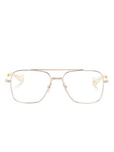 gold-tone metal pilot frame clear lenses double bridge nose pads sculpted arms with curved tips These glasses come with a protective case. All glasses from FARFETCH are sold as non-prescription frames. Dita Eyewear, Sculpted Arms, Glasses Accessories, Glasses Frames, Gold Tone Metal, Protective Cases, Flight, Fashion Branding, Lenses