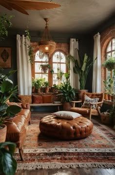 a living room filled with lots of plants and furniture