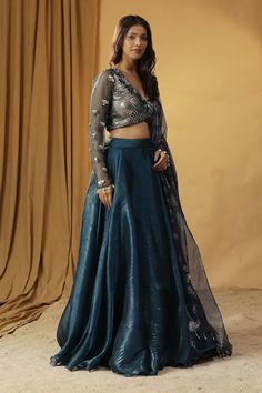 Navy blue organza blouse with sequins, pearls and beads embroidery. Paired with mirror, shells embroidery dupatta and solid lehenga. - Aza Fashions Chanderi Lehenga For Evening Festivals, Organza Traditional Wear With Sequins For Diwali, Evening Chanderi Lehenga For Festivals, Organza Anarkali Set For Diwali Party, Organza Diwali Traditional Wear With Sequins, Diwali Traditional Organza Wear With Sequins, Diwali Organza Traditional Wear With Sequins, Floor-length Chanderi Blouse Piece For Party, Party Wear Organza Blouse Piece For Navratri