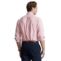 The cotton oxford shirt made its debut at the beginning of the Ralph Lauren brand, and since then, has solidified its status as a pillar of the Polo look. Today, Mr. Lauren continues to design countless variations of his iconic shirt, including this relaxed version that is finished with Polo Ralph Lauren's multicolored signature Pony..Approx. model height is 6'1' and he is currently wearing a size medium.Size M has an approx. 31-1/2' body length.Classic fit: Polo's roomiest silhouette.Button-dow Casual Ralph Lauren Button-up Top, Ralph Lauren Fitted Button-up Shirt, Classic Collared Ralph Lauren T-shirt, Ralph Lauren Formal Button-up Shirt, Affordable Cotton Ralph Lauren T-shirt, Polo Ralph Lauren Mens, Oxford Shirt, Model Height, Polo Ralph