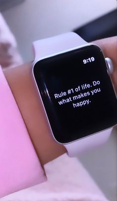 an apple watch with a quote on the screen saying, rules of life do what makes you happy