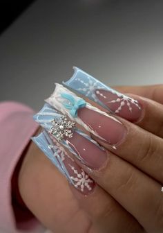 not my work Snowflake Acrylic Nail Designs, Christmas Nails Dramatic, Coffin Nails Designs Christmas, Christmas Theme Acrylic Nails, Matte Blue Christmas Nails, Christmas Nail Inspo Coffin, Christmas Baddie Nails Acrylic, Christmas Acrylics Square, Winter Junk Nails