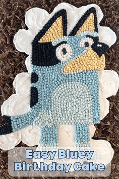 an easy bluey birthday cake made out of crochet and yarn with the words, easy bluey birthday cake written on it