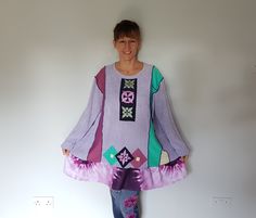 "A beautiful  upcycled tunic top made of acrylic lavender sweater, tie dye and colourful fabrics. Decorated with floral appliques. Tie dye frill at the bottom. Very, very soft, comfortable, stretchy  and roomy. Unique item, impossible to copy.  Size 2x - 3x Measurements  bust : 56\" flat and stretches freely to 62\" length : 32\" Machine washable on wrong side on gentle program in 30 degrees. There is a lot of outstanding designs in different sizes in my shop  www.etsy.com/uk/shop/BosaHandmade?r Sweater Dress Plus Size, Sweater Upcycle, Dress Upcycle, Plus Size Hippie, Artsy Dress, Upcycle Clothing, Boho Coat, Upcycled Sweater, Lavender Sweater