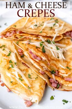 ham and cheese crepes on a white plate