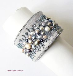 Bead embroidery cuff bracelet with freshwater by jewelrywithsoul, $140.00...I'd like to figure out how to make something similar...this is a little blingy, but I like the idea. Handmade Cuff Bracelet For Wedding, Elegant Beaded Cuff Bracelets, Elegant Adjustable Decorative Bracelets, Embroidered Bangle Jewelry For Wedding, Embroidered Bangle For Wedding, Handmade Wedding Cuff Bracelet, Handmade Cuff Bracelets For Weddings, Handmade Bohemian Pearl Bracelet For Wedding, Bohemian Handmade Pearl Bracelet For Weddings