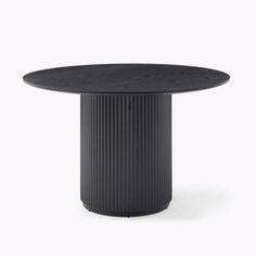 a black round table on a white background