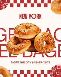 bagels are stacked on top of each other in front of a new york sign