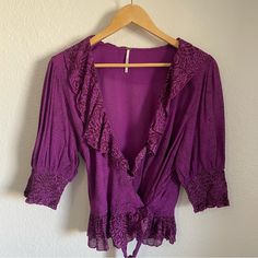 - New Without Tags Free People Blouse - Half Sleeves With Elastic Cuffs - Wrap Style With A Long Sash - Size Medium - Comes From A Smoke Free Home - 1-2 Day Shipping! Purple V-neck Top With Ruffles, Oc Inspo, Free People Blouse, Ruffle Shorts, Wrap Blouse, Boho Floral, Wrap Style, Free People Tops, Half Sleeves