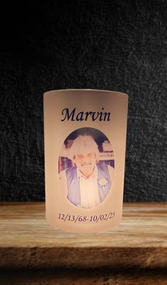 a coffee cup with the name marvin on it and an image of marilyn monroe