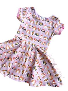 Puppy Party  Twirl Dress in baby, girl, and toddler sizes.  This fun puppy theme twirl dress is perfect for all occasions for the dog lover in your life. Super cute puppy dogs with floral crowns.  Absolutely adorable and a favorite among all ages, baby, toddler, and girls. The circle skirt on the dress makes this the perfectly twirly piece. Made with a 95% Cotton, 5% Spandex knit fabric. High quality and so comfy.  Truly Handmade, allow 3-4 weeks before your item is ready to ship. Playful Fitted Twirl Dress For Playtime, Fitted Playful Twirl Dress For Playtime, Playful Fitted Twirl Dress For Play, Cute Fitted Twirl Dress For Playtime, Puppy Pawty, Lover Dress, Puppy Dress, Ruffled Socks, Super Cute Puppies