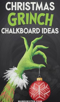 the grinch christmas ornament is hanging on a chalkboard with an ornament