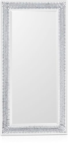 a white framed mirror on a white background