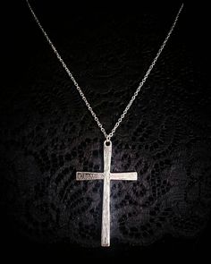 A large and solid Cross pendant on extra long chain! Cross is made of solid hard wearing corrosion resistant Zinc alloy on a Stainless Steel chain.  Charm measures 6 cm high and 3.5cm wide (approx.) Chain extends from 60 to 70 cm circumference (approx.) with lobster claw fastening. Metal Cross Necklace With Large Pendant, Large Metal Cross Pendant Necklace, Gothic Silver Jewelry With Large Cross Pendant, Gothic Metal Cross Necklace, Silver Gothic Cross Necklace, Gothic Silver Pendant Cross Necklace, Gothic Stainless Steel Cross Necklace, Cross Charm Necklace, Gothic Pendant