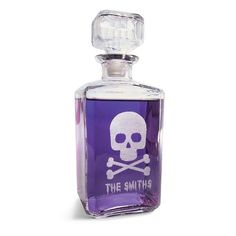 a purple bottle with a skull and crossbones on the top that says, the smiths