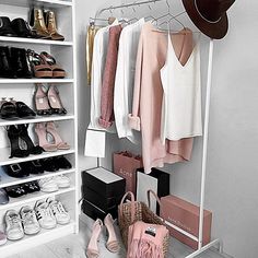 an organized closet with shoes, handbags and purses