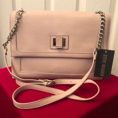 Nwt! Super Cute Blush Pink Turn Lock Crossbody By Steve Madden! Very Spacious With Two Large Compartments And Smaller Pockets Inside! One Small Blemish On The Side, Please See Last Picture! Measurements In Pics! Ask Questions If Needed! Blush Crossbody Shoulder Bag For Spring, Blush Bag With Adjustable Strap For Spring, Spring Blush Bag With Adjustable Strap, Blush Evening Bag With Adjustable Strap, Spring Blush Bag With Detachable Strap, Blush Rectangular Bag For Spring, Beige Crossbody Bag With Fold Over Clasp, Blush Crossbody Shopping Bag, Blush Crossbody Bag For Shopping