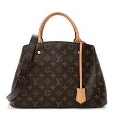 This is an authentic LOUIS VUITTON Monogram Montaigne MM. This chic tote is crafted of Louis Vuitton monogram coated toile canvas in brown. The bag features rolled vachetta leather top handles, an optional shoulder strap, and gold hardware. The top opens to a partitioned plum-purple microfiber interior with patch pockets and a central zipper compartment. Brown Coated Canvas Bag For Everyday Luxury, Luxury Monogram Canvas Satchel With Leather Handles, Classic Monogram Canvas Satchel With Leather Handles, Everyday Luxury Bags With Leather And Monogram Canvas, Luxury Everyday Monogram Canvas Bag With Leather Trim, Classic Brown Signature Coated Canvas Bag, Luxury Satchel With Leather Handles And Coated Canvas, Monogram Canvas Satchel With Leather Handles For Shopping, Brown Bags With Leather Handles In Signature Coated Canvas