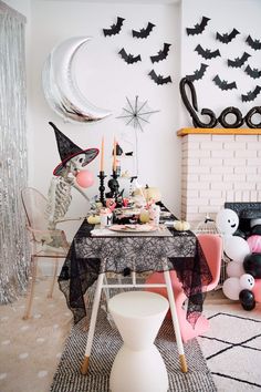 a halloween party with bats and decorations