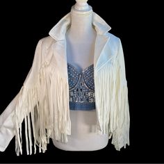 So Fun! Western Style Open Front Jacket Has Fun Fringe Down Sleeves And Back. Fabric Is A Soft Microfiber That Feels Like Suede. For A Totally Hot Look Combine With The Denim Jeweled Bustier Shown. Bundle Both For A Discount. Fitted White Outerwear For Festival, Fitted Leather Jacket For Festival, Chic Fitted Outerwear For Festivals, Chic Fitted Festival Outerwear, Long Sleeve Biker Jacket With Fringe For Spring, Spring Biker Jacket With Fringe, Spring Fringed Long Sleeve Biker Jacket, Spring Fringe Long Sleeve Biker Jacket, Fitted Fringe Outerwear For Winter