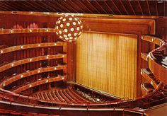 an overhead view of a concert hall from the stage looking down at the seats and railings