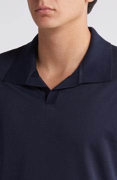 A polished take on the classic polo is made from breathable stretch cotton to keep you looking (and feeling) cool. 27" length (size medium) Polo collar Short sleeves 60% polyester, 40% cotton Machine wash, dry flat Made in Peru Classic Blue Polo Shirt With Seamless Collar, Fitted Golf Tops With Ribbed Collar, Fitted Tops With Ribbed Collar For Golf, Classic Navy Collared Top, Classic Polo Shirt With Seamless Collar For Golf, Classic Golf Polo Shirt With Seamless Collar, Classic Fitted Navy Polo Shirt, Classic Navy Fitted Polo Shirt, Classic Relaxed Fit Tops For Golf