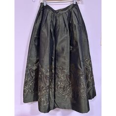 Add A Touch Of Glamour To Your Formal Wardrobe With This Stunning Green Asian Gazebo Design Taffeta Ballgown Ball Skirt From Oscar De La Renta. The 1980s Vintage Piece Features A Waist Size Of 28 Inches And A Waist To Hem Length Of 36 Inches. The Skirt Is Free At The Hips And Has Pockets For Added Convenience. Perfect For Evening Wear, This Original Piece Was Made In The United States, Adding To Its Authenticity And Charm. Upgrade Your Collection Of Vintage Clothing With This One-Of-A-Kind Skirt That Guarantees To Turn Heads. The Skirt Is Size M And Has A Regular Size Type. It's An Ideal Choice For Those Who Love The Vintage Look Without Compromising On Comfort. Add This Beauty To Your Cart Asian Gazebo, Gazebo Design, Ball Skirt, Prom Wedding, 80s Vintage, 1980s Vintage, Waist Size, Evening Wear, Formal Event