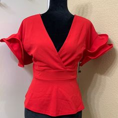 Haute Monde Raffle Sleeve Blouse .Excellent Pre-Owned .Excellent Condition No Holes Or Flaws .With Tag Approximate Measurements .Length 22” .Shoulder 20” .Bust 17” Elegant Red V-neck Blouse, Fitted Tops With Ruffle Sleeves For Night Out, Fitted Ruffle Sleeve Blouse For Office, Elegant Ruffle Sleeve Tops For Night Out, Spring Evening Tops With Ruffle Sleeves, Formal Fitted Top With Ruffle Sleeves, Fitted Ruffle Sleeve Top For Evening, Fitted Ruffle Sleeve Evening Tops, Fitted Top With Ruffle Sleeves For Evening