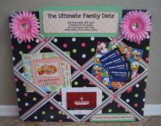 the ultimate family date board is decorated with pink flowers and polka dot paper, along with matching cards