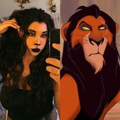 a woman taking a selfie next to an image of the lion king