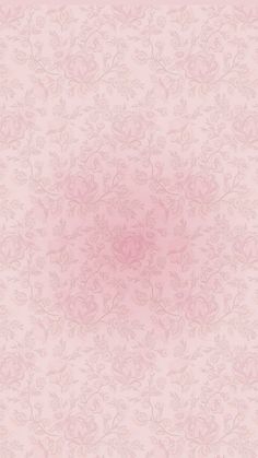 a pink wallpaper with flowers on it