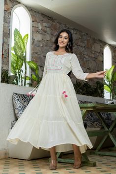 Single Piece Fabric-Cotton Color-White Work-Lace, mirror & embroidery detailing with side tassels Length-Ankle Length Sleeves-3/4th Sleeves Neck-Round Neck Occasion-Casual wear Washing care-Hand wash Mirror Embroidery, Embroidery Detailing, Anarkali Kurta, White Mirror, Embellished Gown, Embroidery Details, Indian Wear, White Fabrics, Anarkali