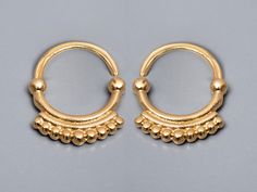 "Unique Small 14k Solid Yellow Gold Hoop Earrings, Boho Indian Style Tiny Hoops, Recycled Gold Jewelry. Small dainty hoop earrings are the ultimate way to add an ethnic and Indian touch to your look and feel. My solid gold collection combines high quality with exotic, wild tribal style, and cleanliness modern western style. Together they create a daring yet delicate look. The collection is handmade and handcrafted from high-quality solid gold. Each item is made to order with my deepest love and Handmade Gold Hoop Septum Ring, Nickel-free Small Hoop Gold Piercings, Hoop Earrings Indian, Recycled Gold Jewelry, Small Hoop Earrings Gold, Small Gold Earrings, Boho Wedding Ring, Tiny Gold Earrings, Daith Jewelry