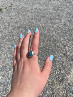 This is a handmade Aquamarine ring made with a sterling silver (.925) setting. Size US 8. Plain band, oxidized, twisted embellishment, serrated bezel. Find us on Instagram at @ironwood.baubles or ironwoodbaubles.com Feel free to reach out with any questions :) Silver Turquoise Ring With Oxidized Finish As A Gift, Hand Forged Sterling Silver Blue Ring, Plain Bands, Aquamarine Rings, Blue Rings, Aquamarine, Rings Statement, Ring, Statement Rings