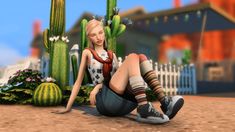 a woman sitting on the ground next to cactuses and cacti in a virtual environment