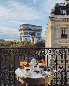 breakfast on the balcony overlooking the arc de trioes