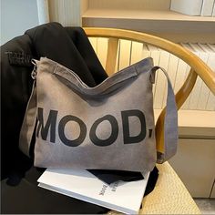 As Seen On Tiktok - Perfect Bag For Everyday Use Spacious Multi-Layer Canvas Shoulder Handbag. Durable, Water-Resistant, And Comfortable For Unisex Commute, Fitness, And Outdoor Activities. In Color Gray With Black Lettering. Shoulder Bag, Crossbody Or Satchel. Letter Canvas, Korean Student, Canvas Letters, Adventure Style, Canvas Designs, Shoulder Handbag, Perfect Bag, Leather Hobo, Clothing Size Chart