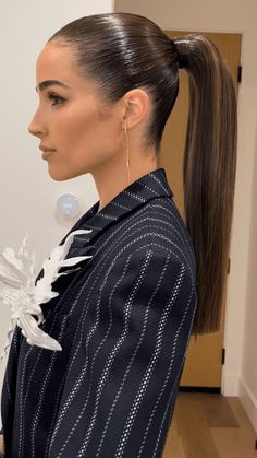 Slicked-back ponytails are easy to achieve. We rounded up 16 ways to wear the sleek style inside. Sleek Hair With Headband, Gelled Ponytail Hairstyles, Slick Hair Ponytail, Long Straight Hair Ponytail Styles, Low Ponytail Straight Hair, Slick High Bun Hairstyles, Slick Back Ponytail Wedding, Slick Back Long Ponytail, Middle Slick Back Ponytail