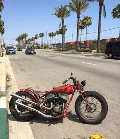 a motorcycle is parked on the side of the road