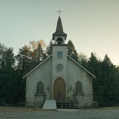 an old church with a steeple on the top